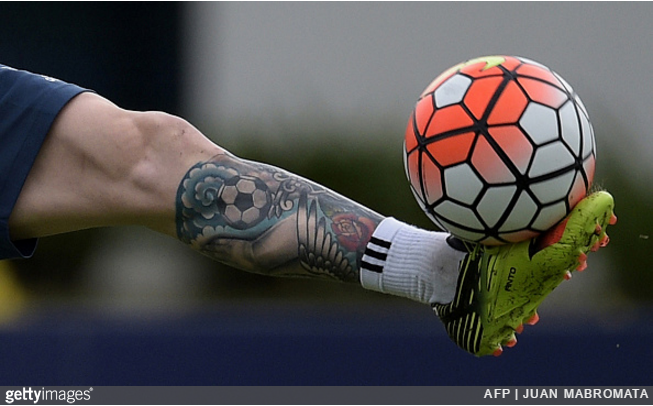 Handsome man with tattoos holding soccer ball covering mouth with hand  shocked and afraid for mistake surprised expression Stock Photo  Alamy