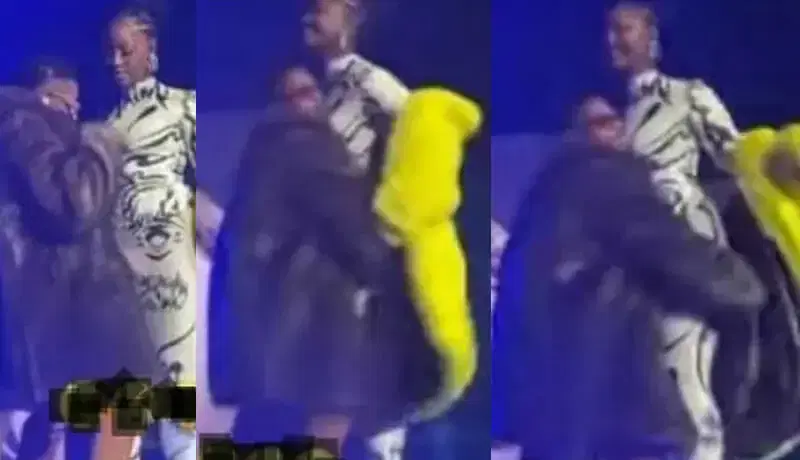 video tems epic reaction after wizkid grabbed her by her backside on stage during his concert.jpg